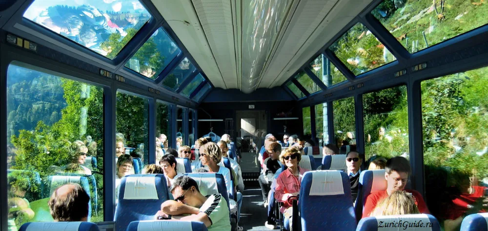 Passengers in a GoldenPass panoramic carriage