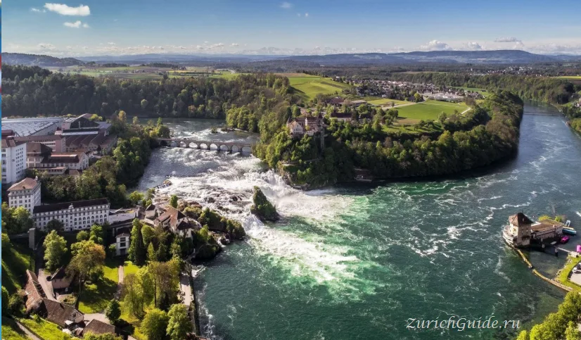 The Rhine Falls from above with Schloss Laufen on the cliff